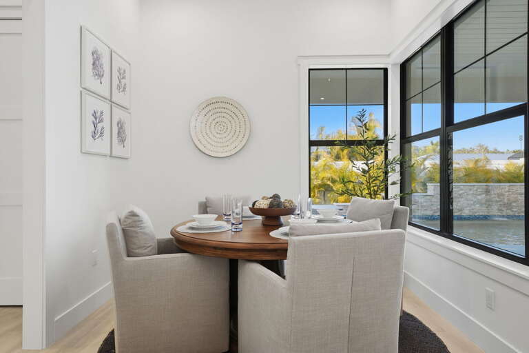 Take a different angle on the same table and you'll understand why this room works — it handles twelve without feeling like a cafeteria.