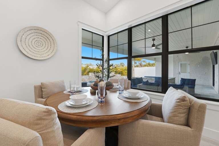 Pull a chair out and look around the dining corner — every detail in this room was considered, right down to the decor that actually belongs here.