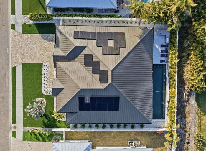 Pull into the garage and unload — you're home for the week, and it looks exactly like this from the street.