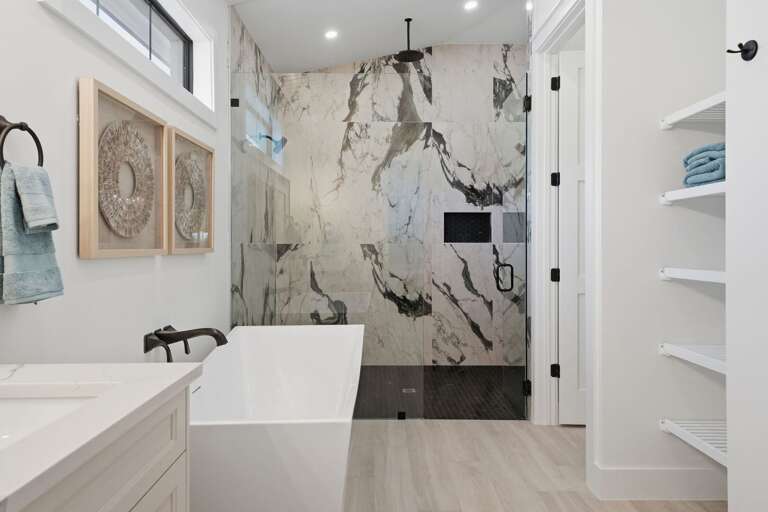 Set your things on the vanity counter and take stock — this bathroom was finished properly, not as an afterthought.