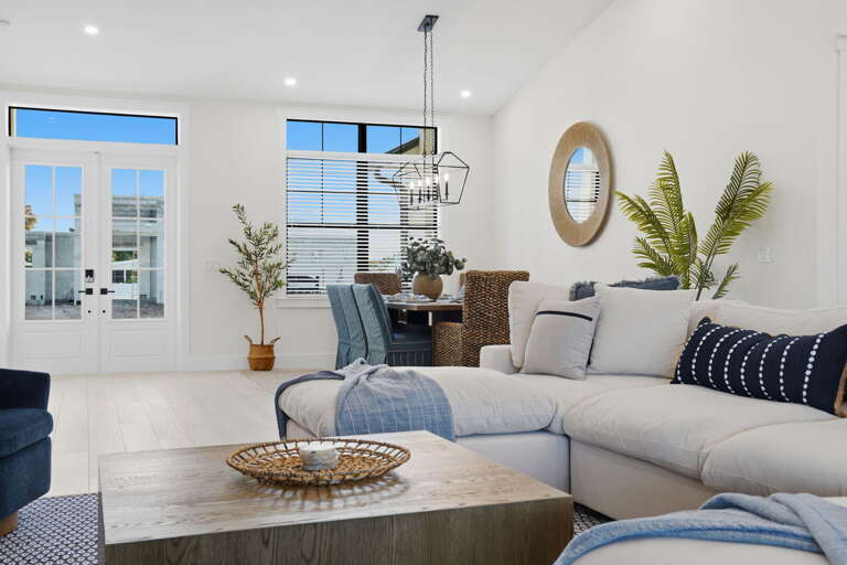 Sink into the sofa and watch the afternoon light shift across the living room — not a bad way to spend an hour before dinner.