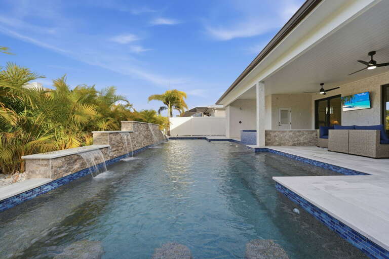 Step in slowly from the entry side — the hot tub depth is forgiving and the surrounding deck makes getting in feel like an event.