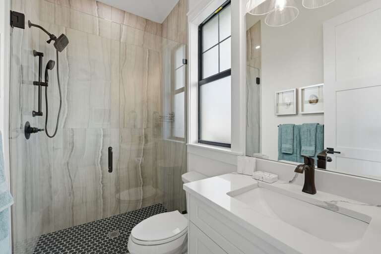 Turn on the faucet and find hot water ready immediately — small details in a well-run property always show up in the bathroom first.