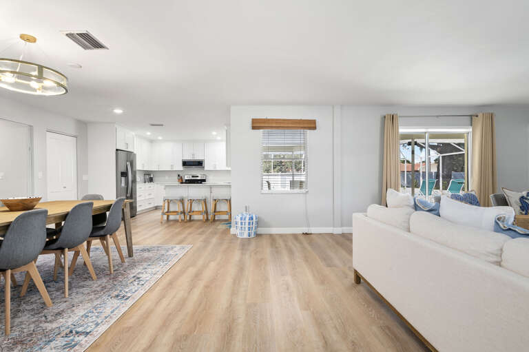 Gather the whole group in one room without crowding anyone — the open layout keeps the cook in the conversation.
