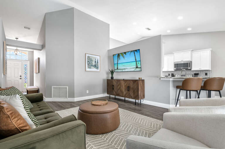Breathe easy — the vaulted ceilings keep the open-plan feeling spacious, with living, kitchen, and dining all flowing together.