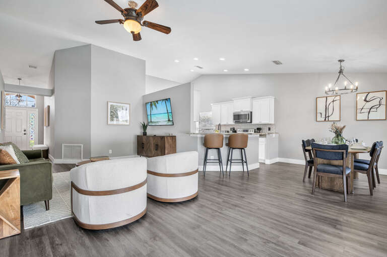 Take it all in from one spot — living, dining, and kitchen share the same open footprint, so the whole group stays connected.