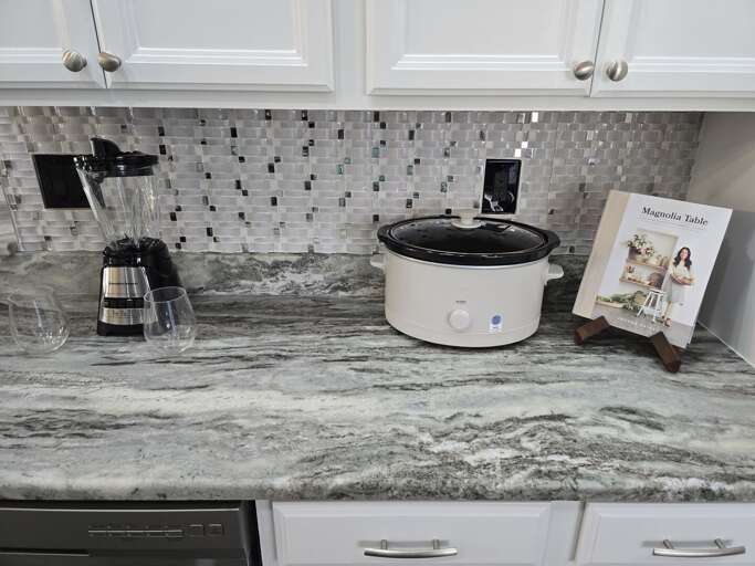 Stock your morning before anyone else wakes up — the counter has a blender for smoothies, a coffee setup, and everything you need to get the day started.