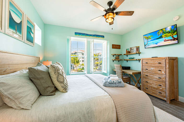 End the night with your show from the king bed, plantation shutters drawn, and no alarm set for tomorrow.