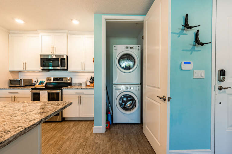 Pack lighter — the stacked washer and dryer are right there in the unit, so laundry happens on your schedule, not a laundromat trip.