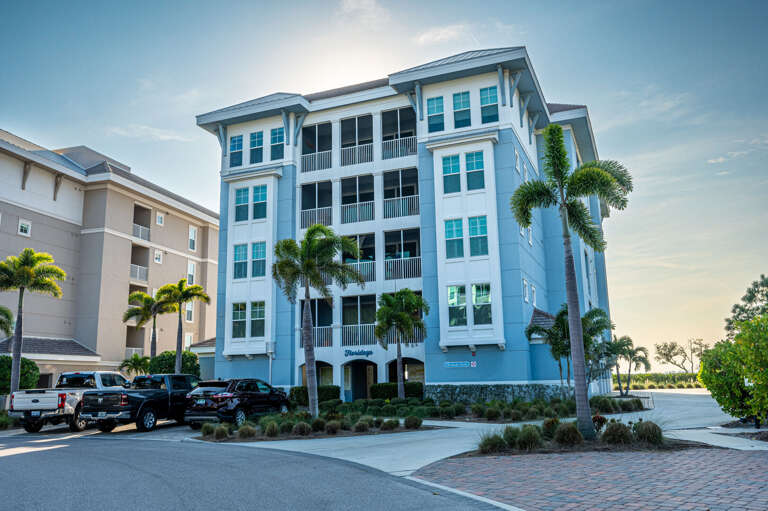 Pull into a well-lit covered garage at the end of the night — parking is included and the building is easy to spot.