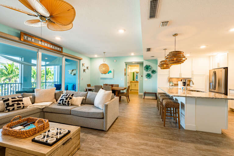 Sit at the island stools and stay in the conversation while dinner's cooking — exactly the kitchen dynamic a vacation needs.