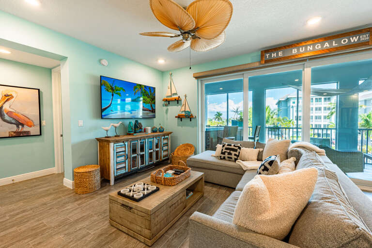 Step inside The Bungalow and feel it immediately — the coastal energy, the open floor plan, and that sign that says you made the right call.