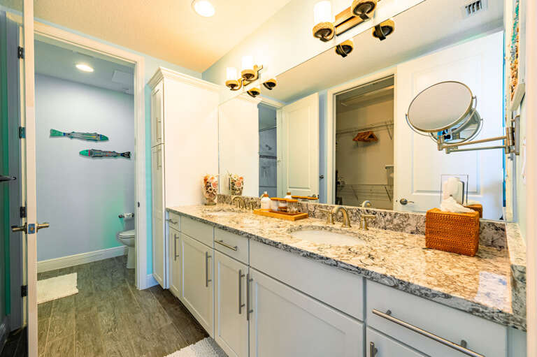 Step into a primary bath with a double vanity and a walk-in shower built for two — no one's waiting their turn.