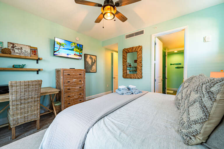 Wake up in a master bedroom that's bright, cool, and steps from the bathroom — your guests will feel taken care of.
