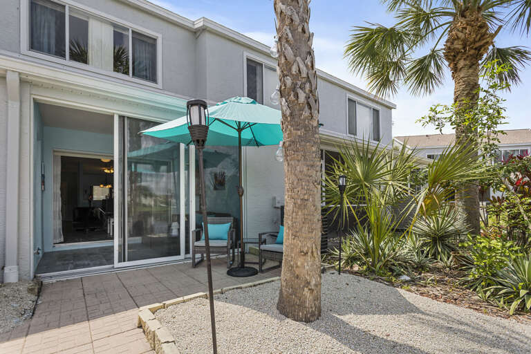Fire up the BBQ, grab the teal umbrella, and turn your private patio into an outdoor dining room.