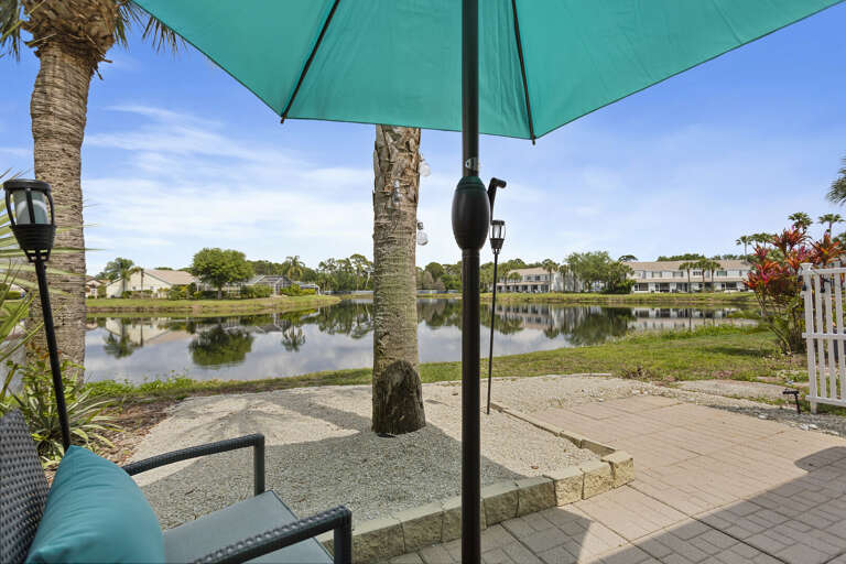 Pull up a chair under the teal umbrella and let the pond views set the tone for your whole trip.