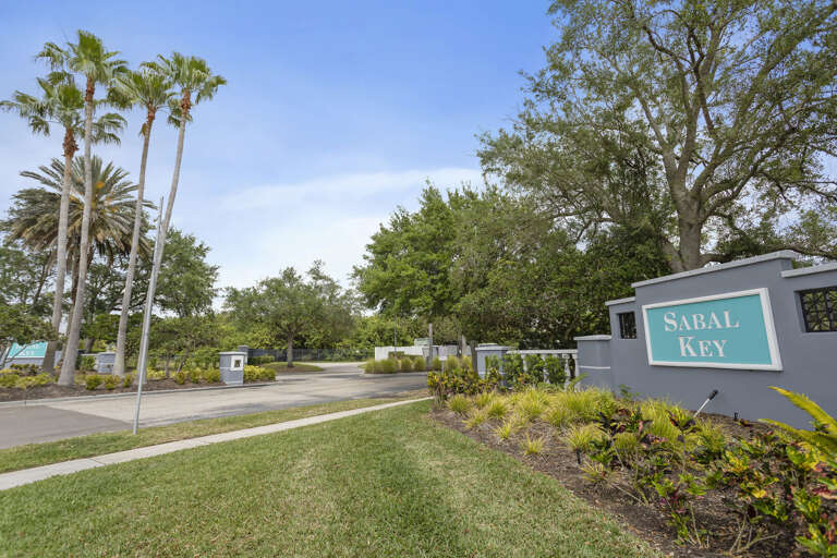 Roll through the Sabal Key gate and feel the stress drop before you've even parked.