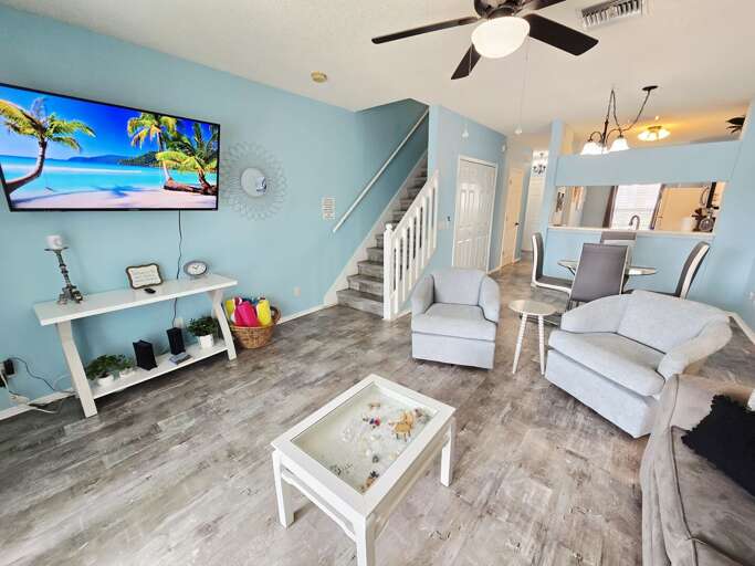 Stream your favorites on the big wall-mounted TV or let the tropical screensaver set the mood.