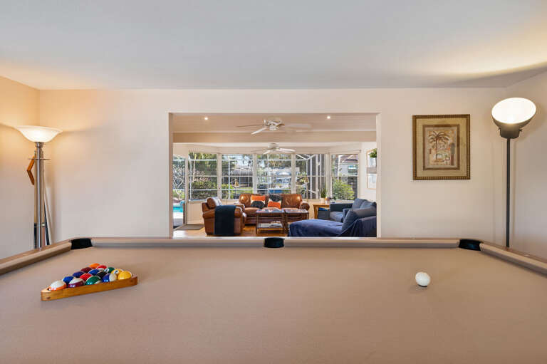 Grab a cue — balls are set and ready on the tournament-quality table, with cue rack and plenty of room to run every shot.
