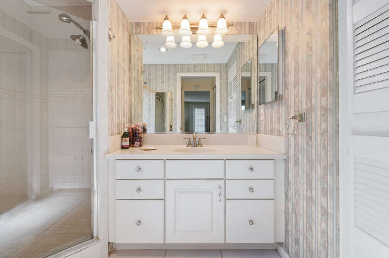 Step into the master ensuite with a walk in shower.