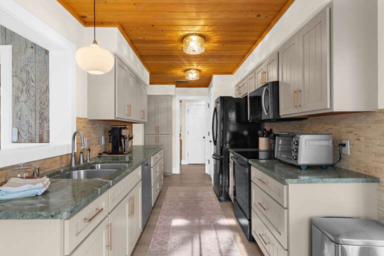 Start your morning at the Ninja coffee maker while the oven warms up — the kitchen is stocked with everything you need and nothing feels cramped even when multiple people are cooking at once.