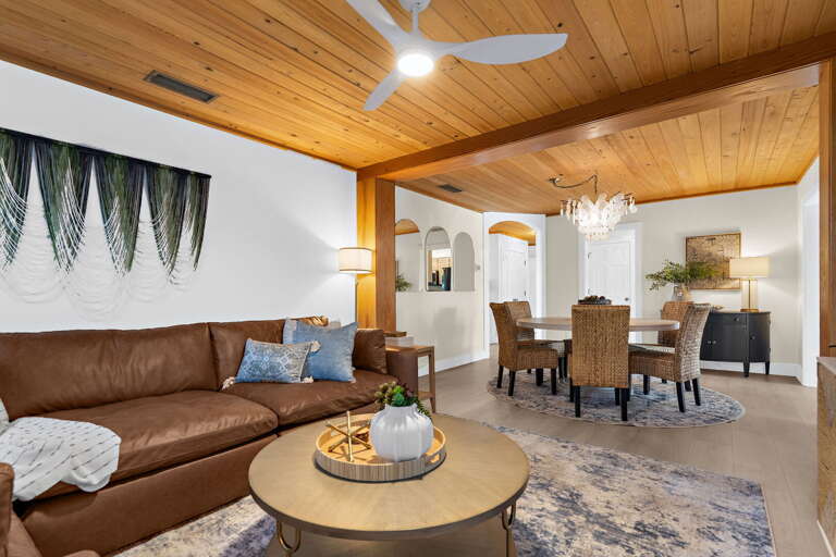 Talk from the sofa to the dining table without raising your voice — the open layout keeps everyone connected whether you are cooking, eating, or just hanging out with a cold drink.
