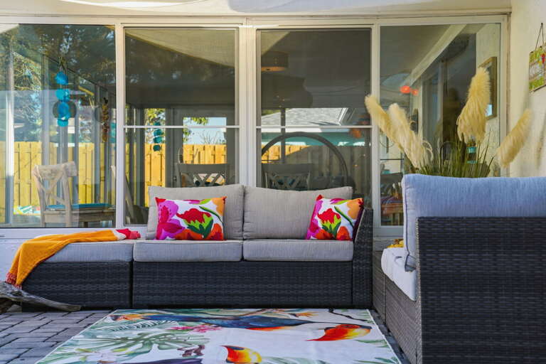 Bring the whole gang! Plenty of colorful, comfy seating makes this lanai the go-to hangout spot for the entire crew.