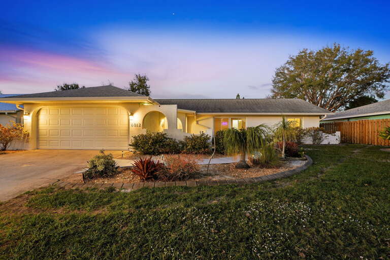 Pull into the driveway and feel the week exhale — your private Florida escape is waiting, palm trees and all.