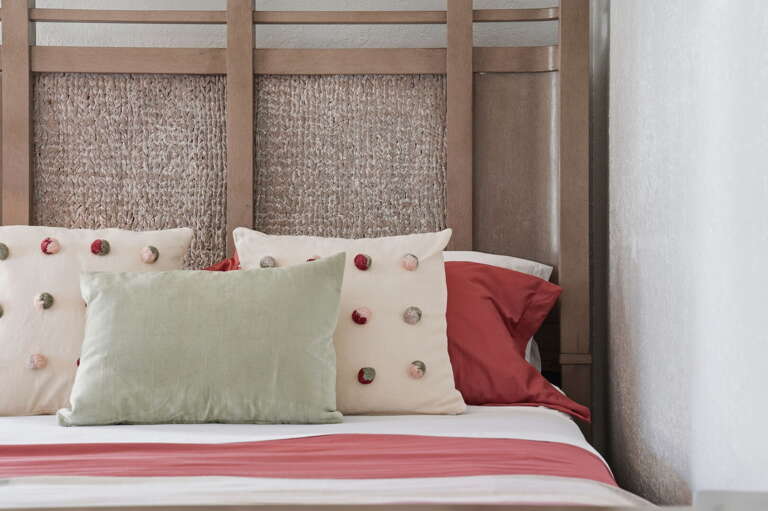 Sweet dreams await! Snuggle into designer linens with a chic coral-and-sage palette that's as comfortable as it is Instagram-worthy.