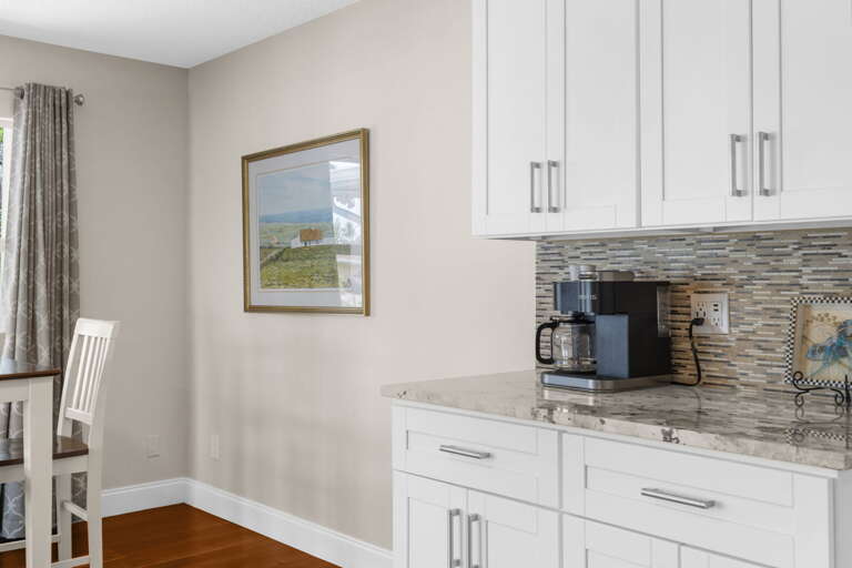 Grab your coffee the moment you walk in — the Keurig is already on the counter, no hunting through cabinets on your first morning.