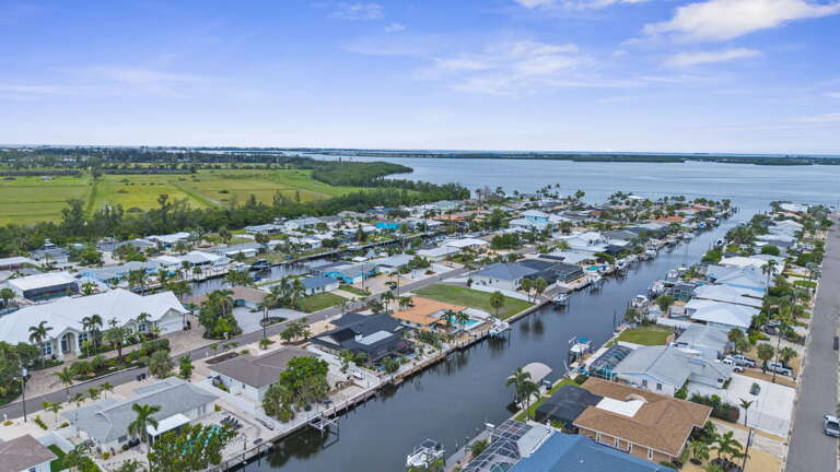 You're right in the middle of it — the whole canal network stretches in every direction, open bay just beyond.