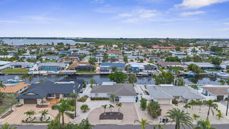 Get on the water and this is what opens up — your dock connects to miles of waterway with the open bay just minutes out by boat.