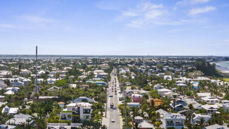 Walk to Pine Ave the island's main road lined with palms and you'll pass every restaurant, shop, located on Pine Ave