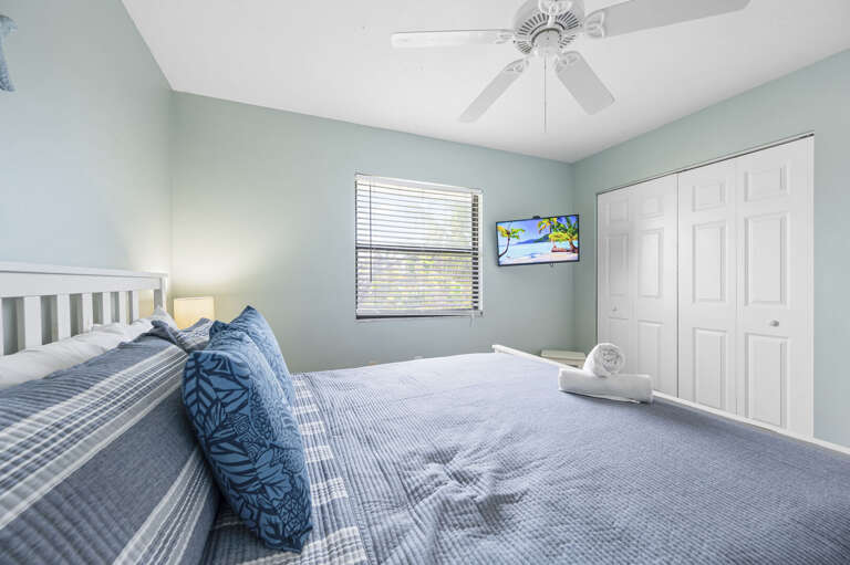Sleep well in the king bed, wake up to the ceiling fan humming — this room has everything you need and nothing you don't.