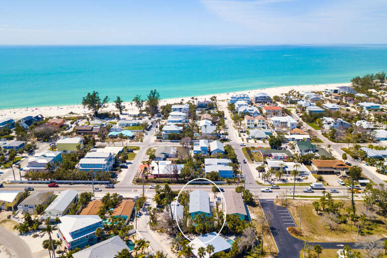 That turquoise water you're looking at? You can walk there in 200 steps — the Gulf is your backyard neighbor.