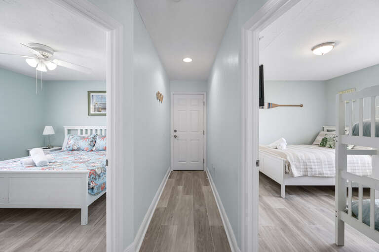 Find your way around in ten seconds — master bedroom to your left, bunk room to the right, front door straight ahead. Everything within a few steps.
