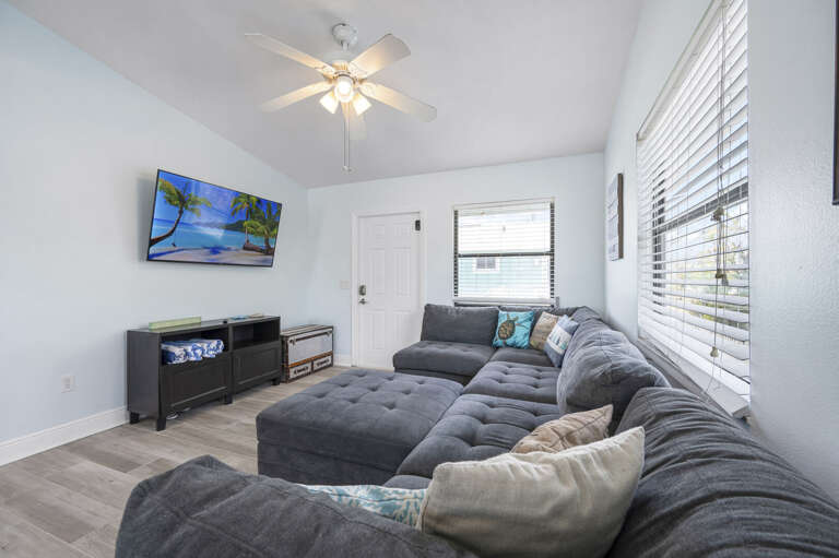 Settle into the sectional up close — more room to stretch out here than it looks from the door. Great for movie nights when the whole group stays in.