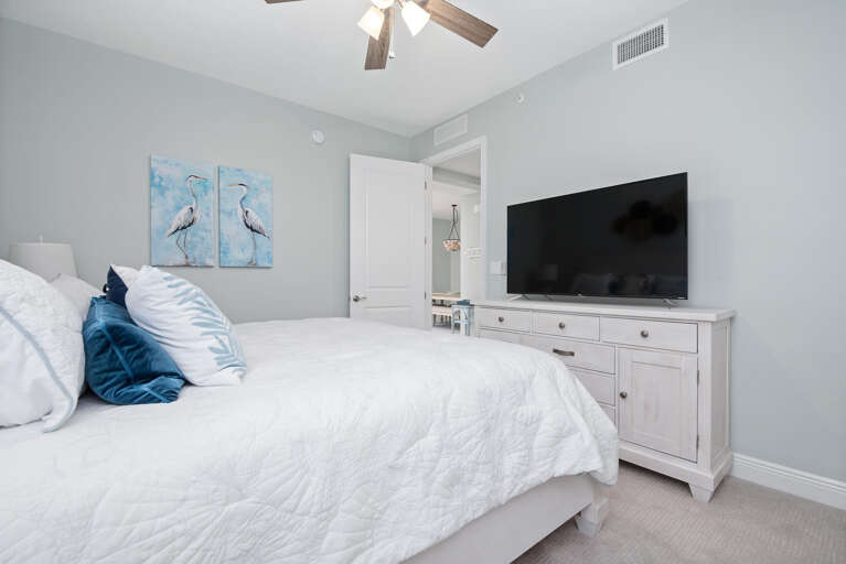 Sleep well in the second king bedroom — ensuite bath, ample closet space, and a TV for late-night downtime.