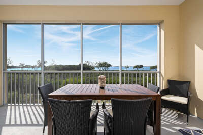 Step onto your private lanai and take in unobstructed bay views — the perfect sunset seat every evening.