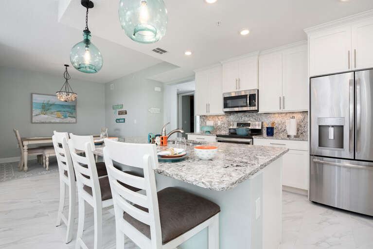 Watch the open-plan kitchen flow straight into dining and living areas — easy hosting, no cramped prep work.