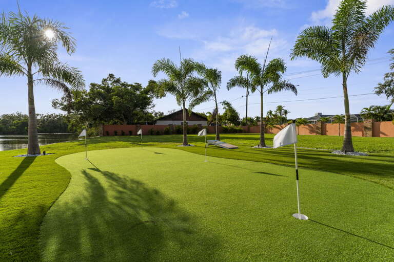 Pour the morning coffee, walk the green in your slippers, sink a putt before anyone else is awake. The kind of vacation morning that happens here.