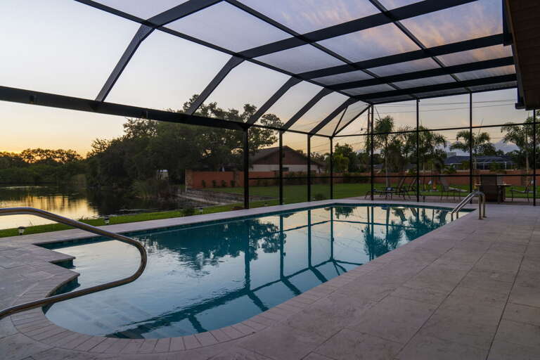 Take your twilight swim, palms going dark against the sky, pool just yours — this is what you booked.