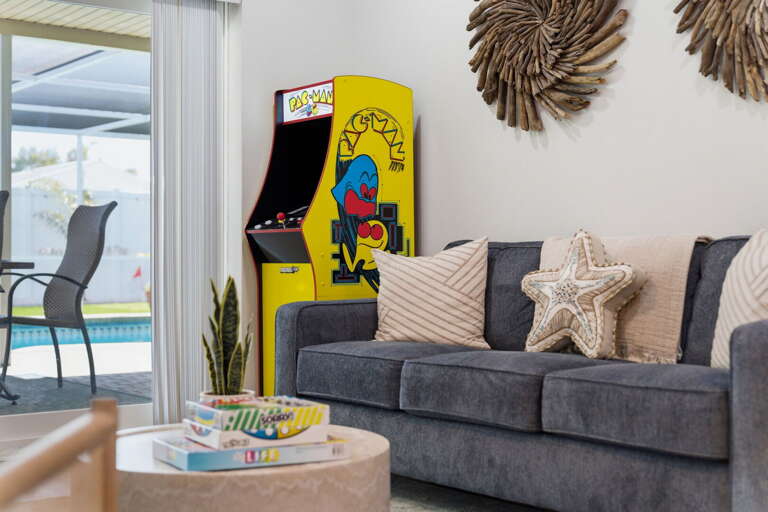 Boot up the Pac-Man cabinet and let the evenings begin — the arcade corner is all yours every night you're here.