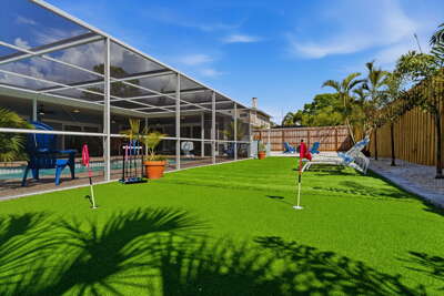 Chip a few balls onto the putting green while the rest of the group floats — the backyard keeps every generation busy all day.