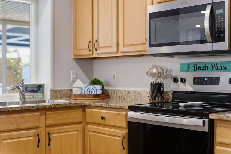 Cook on the stainless range and reach for what you need right on the counter.
