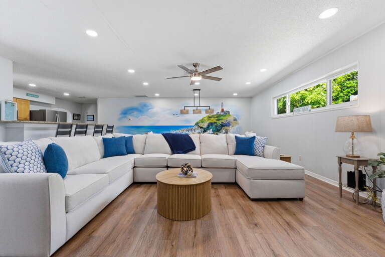 Fill the long sectional with your whole crew for a movie night — no fighting over seats when the sofa stretches this far.