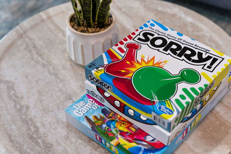 Find Sorry and a stack of board games ready on the table — the rainy afternoon you didn't plan for turns into the night everyone talks about.