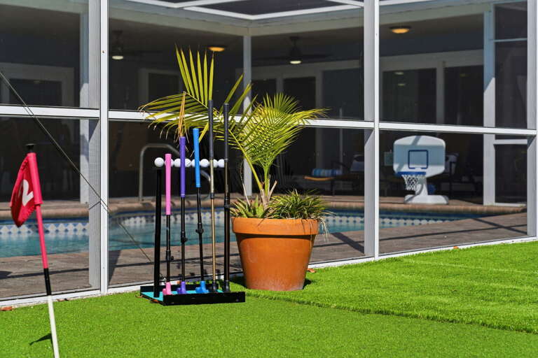Shoot hoops in the pool enclosure then slow it down with some putting practice — the sports corner keeps every age group entertained all day.