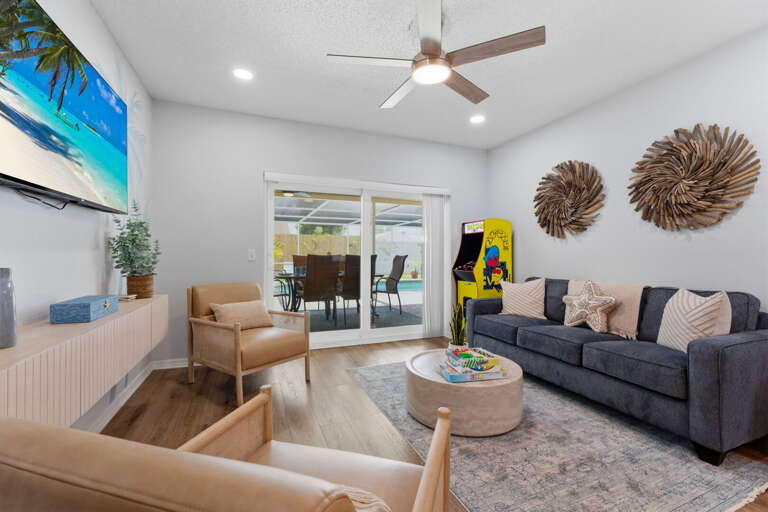 Spread the whole group across the sectional and extra seating — there's room for everyone to gather without anyone doubling up.