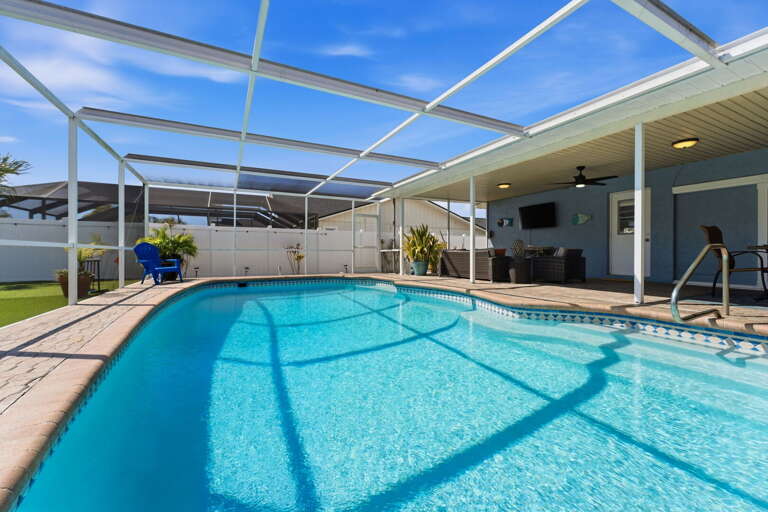 Step outside and see why guests keep coming back — the full screened pool deck gives you a resort feel without leaving home.